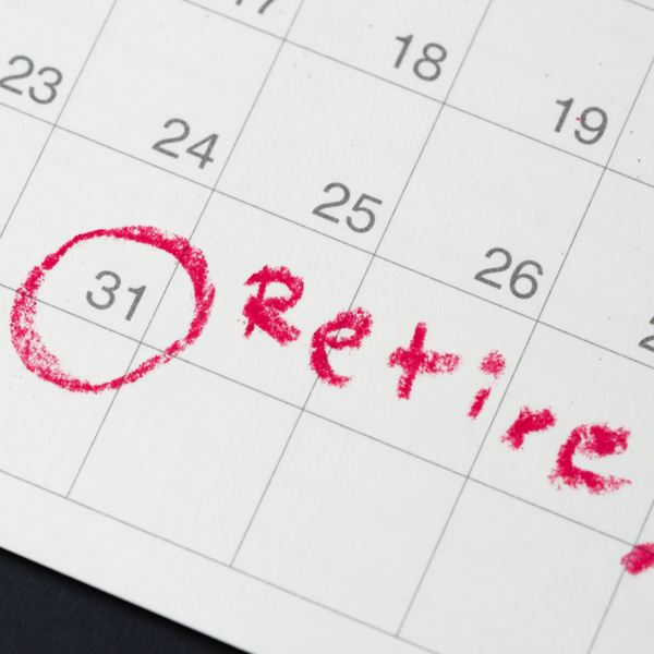 Calendar with a date circled in red and a note reading “Retire!”