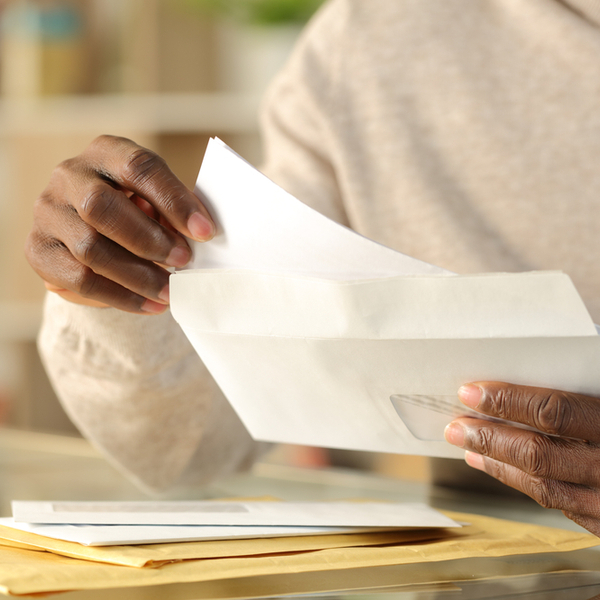 Man opening an envelope