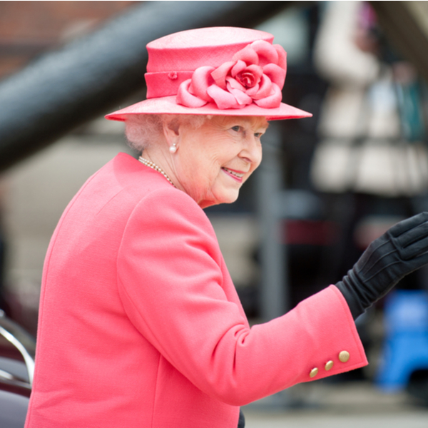 Queen Elizabeth II waving in Liverpool.