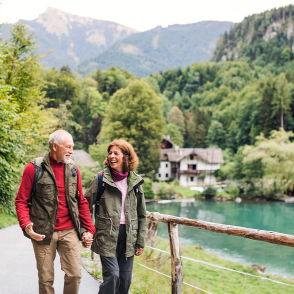 An older couple hiking.