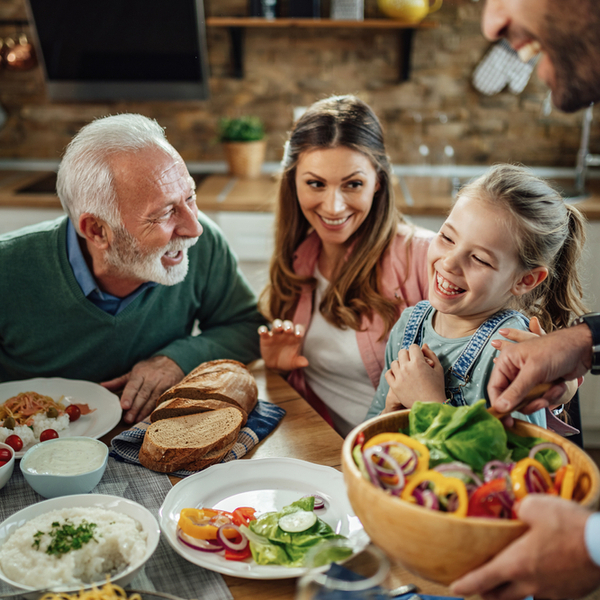 A family enjoying dinner together.