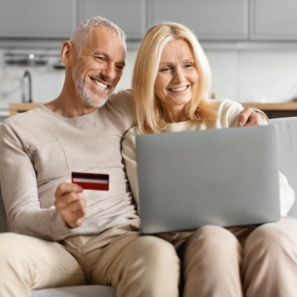 Happy couple shopping online