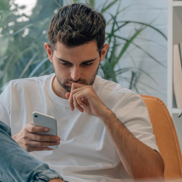 A man using his phone.