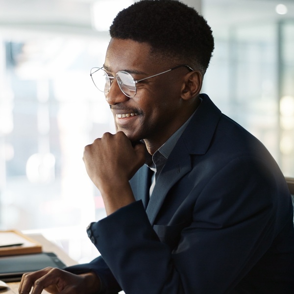 A man working at a computer.