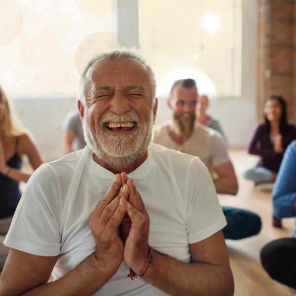 A group of people meditating.